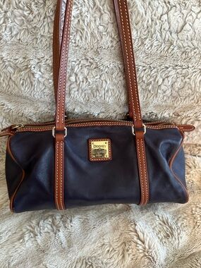 Dooney & Bourke Navy Blue Leather Barrel Bag with Tan Trim